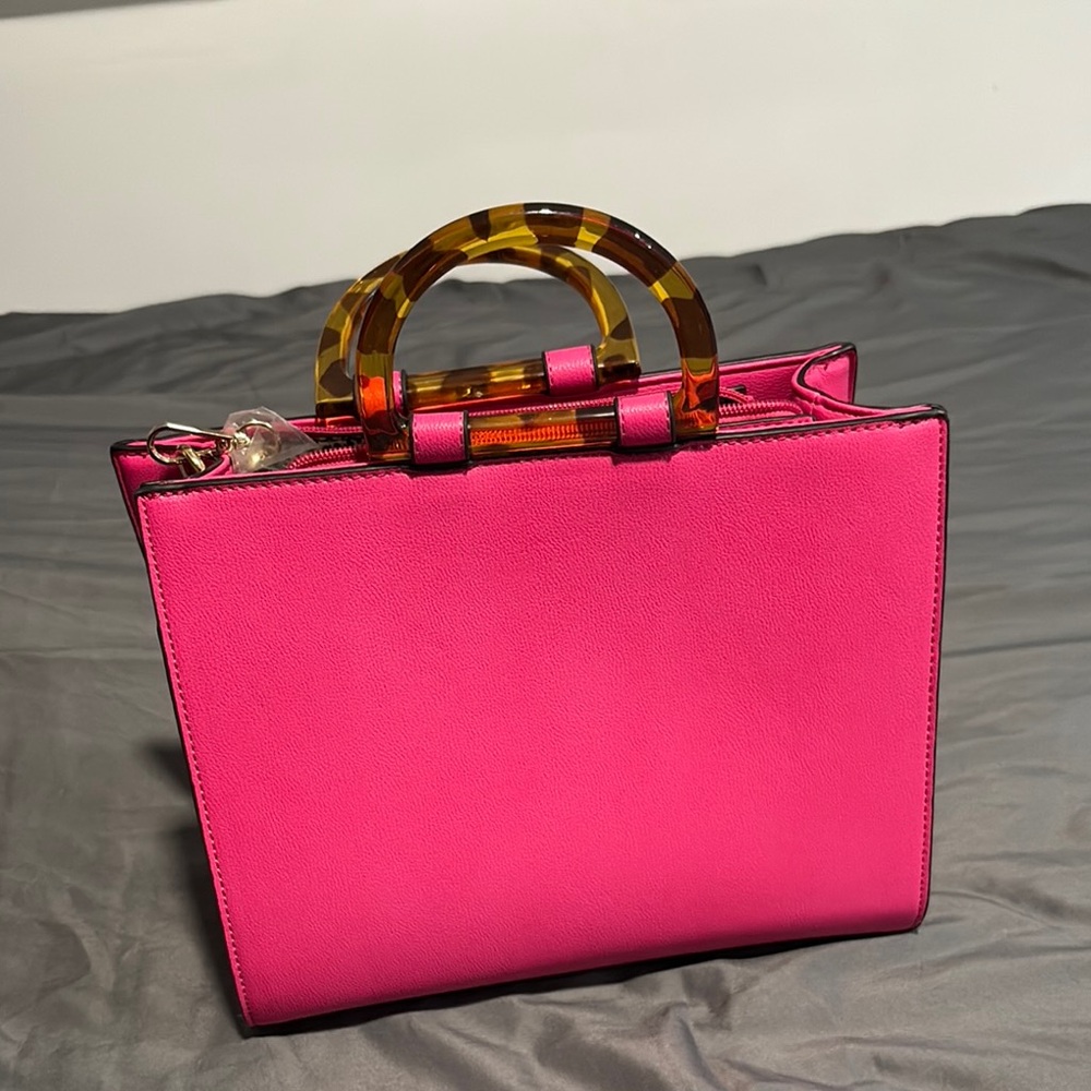Stylish Pink Handbag with Tortoise Shell Handle